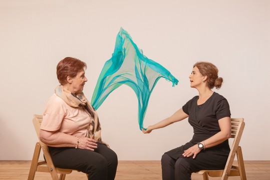 A participant and her teacher during a dance therapy class at Les Grands Ballets' National Center for Dance Therapy