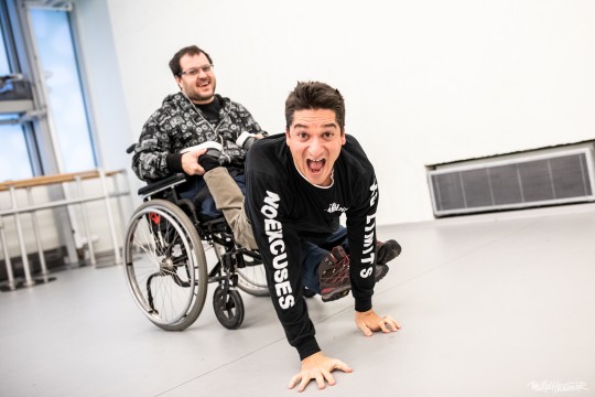Professor Lazylegz in class with a participant in a wheelchair